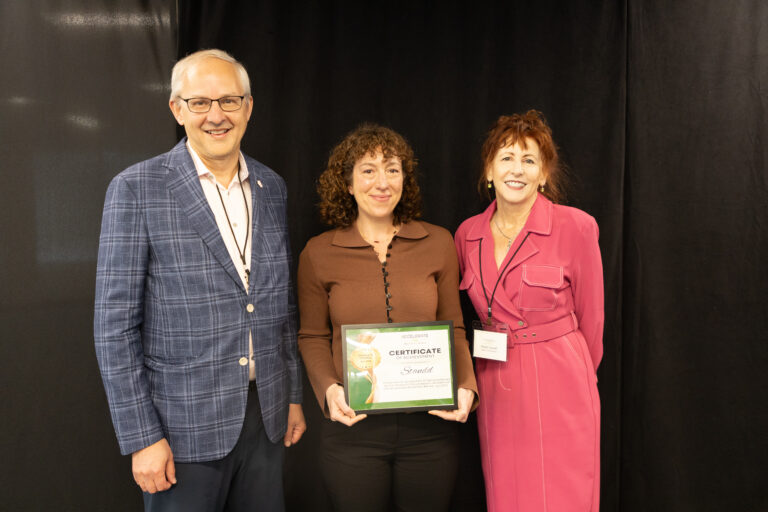 Julie Saltman, Co-Founder & CEO of Standd and People’s Choice Award winner, with Dave Harvey, Executive Director, and Paula Sorrell of Mason Enterprise, April 2026